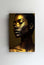 Tablou Canvas - Femeia cu aspect aurit pozand portret