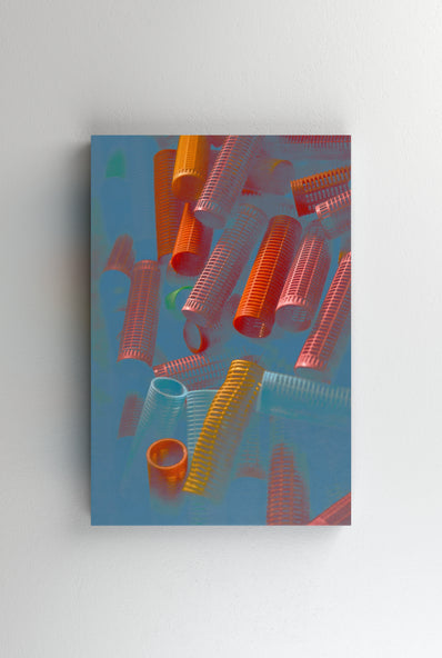 Tablou Canvas - Bigudiuri de par rosii fundal abstract