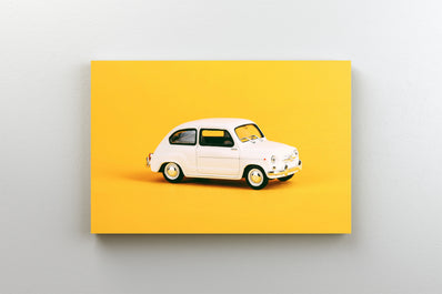 Tablou Canvas - Masina galbena de jucarie
